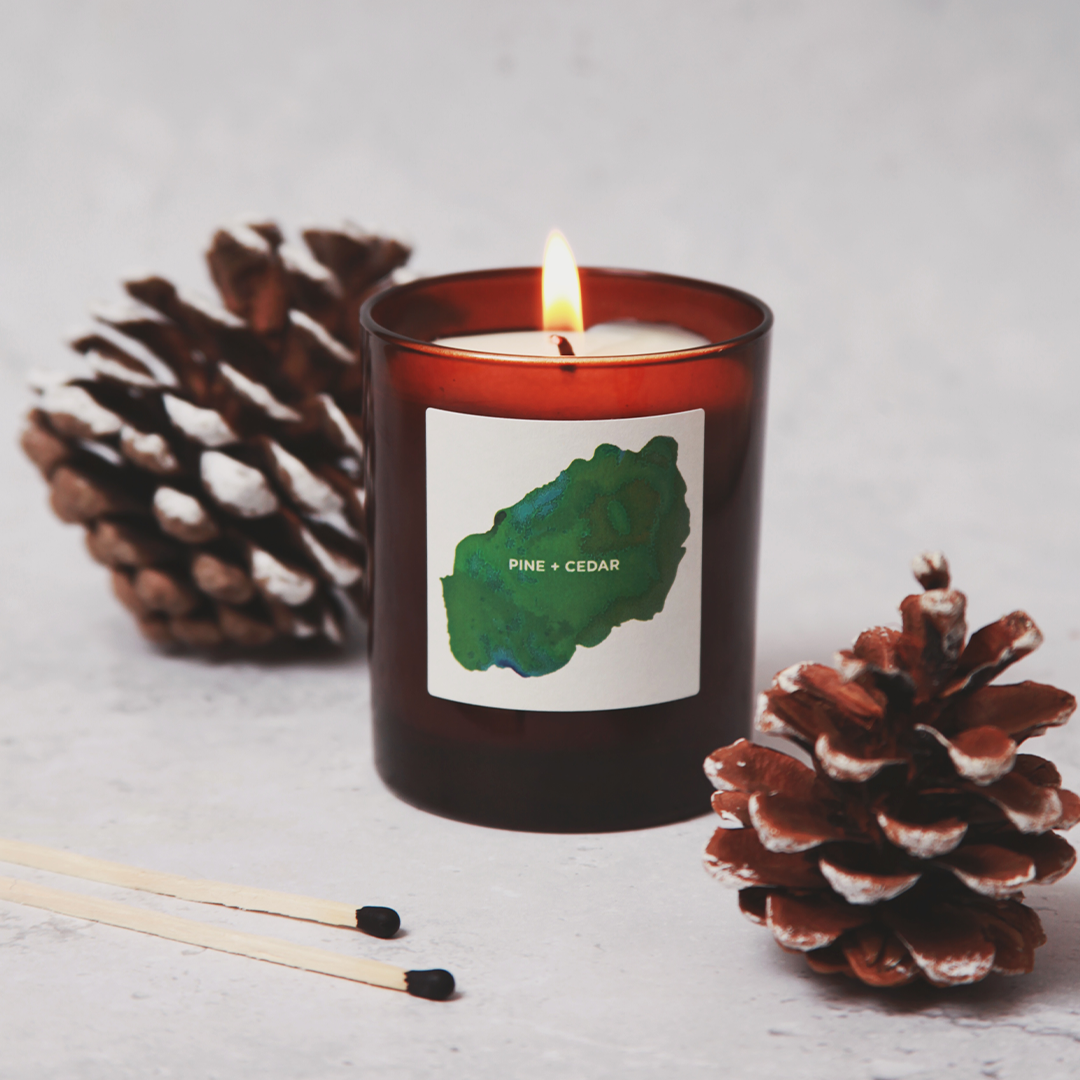 Amber glass candle: pine + cedar